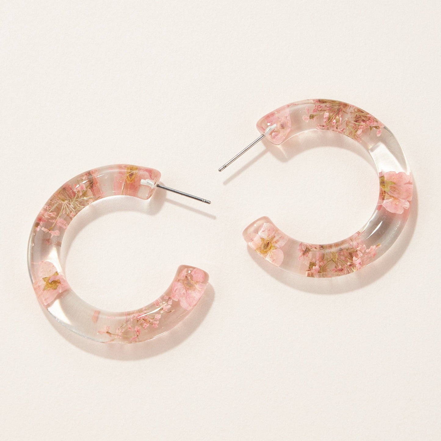 Clear hoop earrings with pink flowers