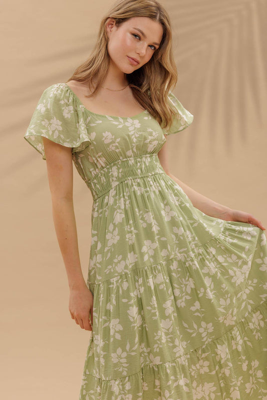 Light green midi dress with a floral pattern and short sleeves